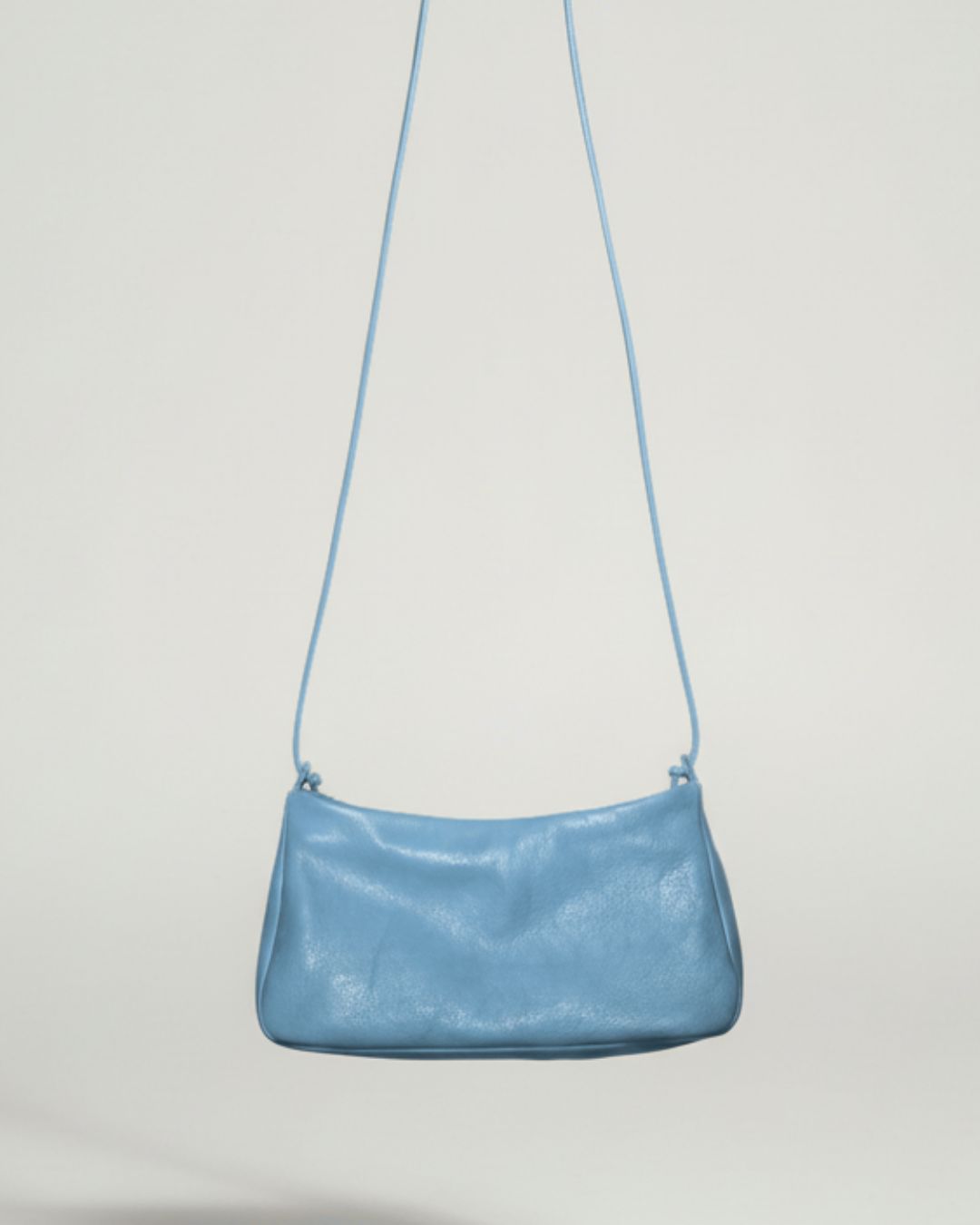 Loli - Medium leather drawstring handbag