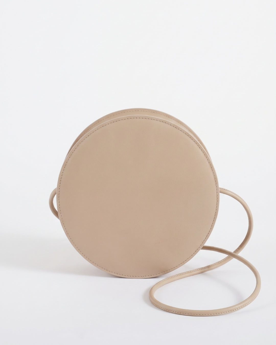 Marcela in Pearl Gray leather · round bag in vegetable-tanned leather, handmade in Málaga · Labienhecha